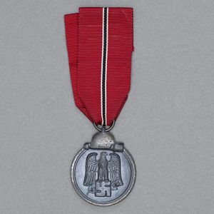 JDE84 Ostmedaille with ribbon