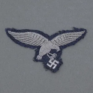 PR3 Uniform removed Luftwaffe officer's national emblem for the service …