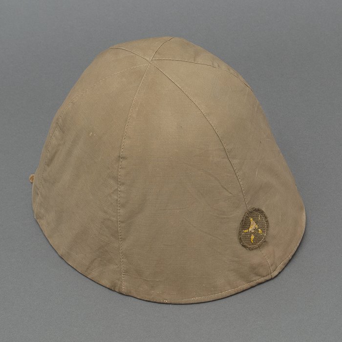 TI2 Imperial Japanese Army Type 90 combat helmet with cover and veteran related items — image 4