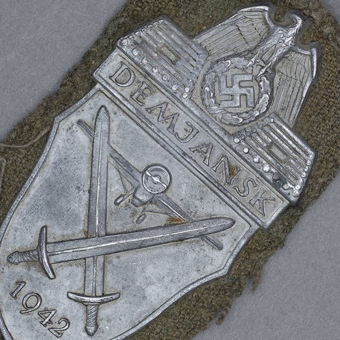 HT21 Uniform removed Demjansk Campaign Shield on field grey cloth backing — image 4
