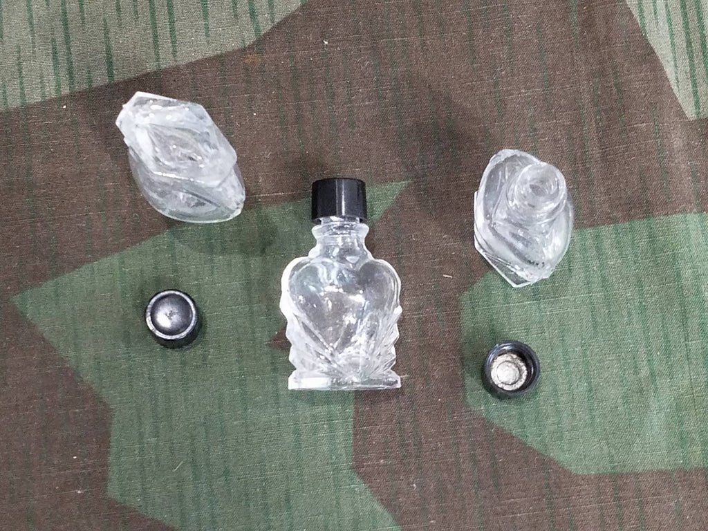 Small Glass Heart Shaped Bottle with Bakelite Lid — image 2