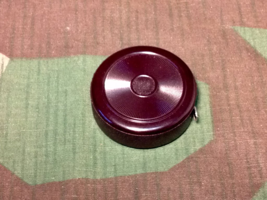 Period Bakelite Advertising Pocket Tape Measure — image 2
