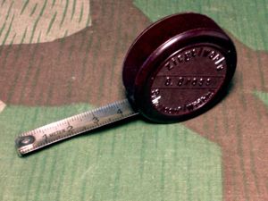 Period Bakelite Advertising Pocket Tape Measure