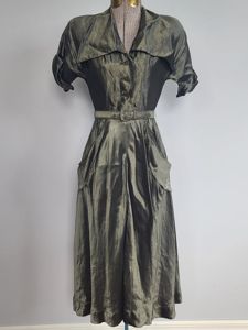 Green Iridescent Dress with Large Collar(B-32' W-23' H-34')