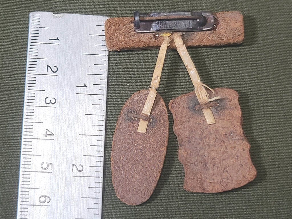 Priorities of 1944 Leather Pin — image 2