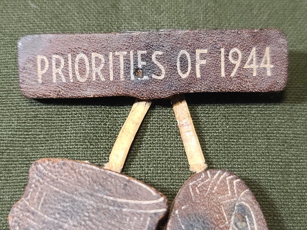Priorities of 1944 Leather Pin — image 3