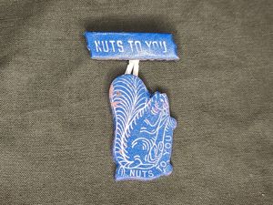 'Nuts to You' Leather Squirrel Pin