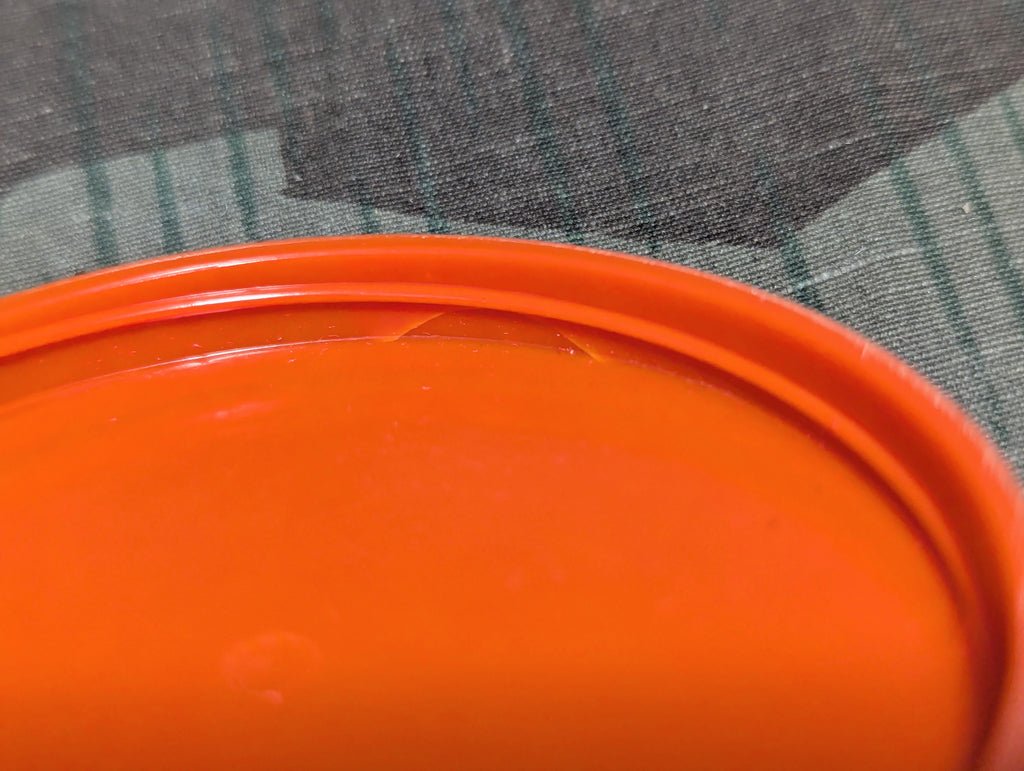 Small Orange Bakelite Kienzle Container — image 6