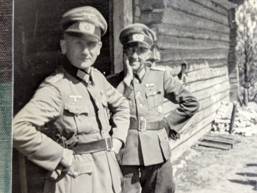 2 Photos of German Officers by Log Houses — image 2
