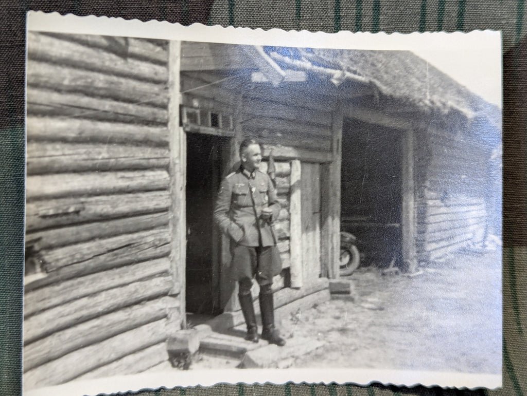 2 Photos of German Officers by Log Houses — image 3