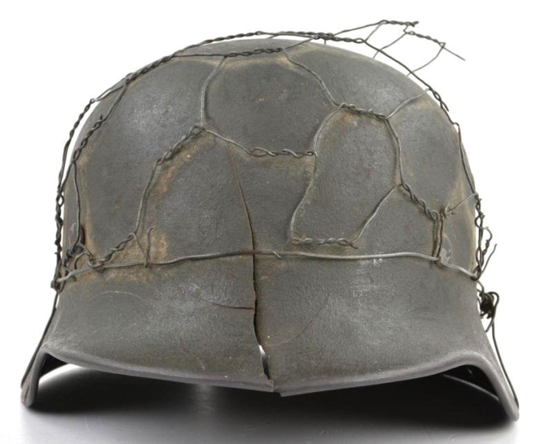 German WH M40 SD Combat Helmet with Battle damage and Half Wire Basket — image 3
