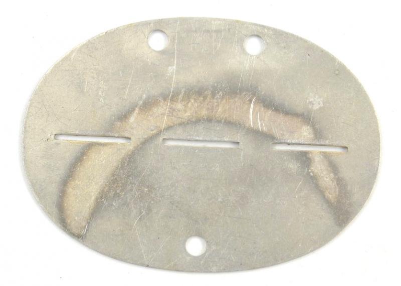 German WH Dog-Tag 'Nsch Kp.mot.Nsch.Fhr.176' — image 2