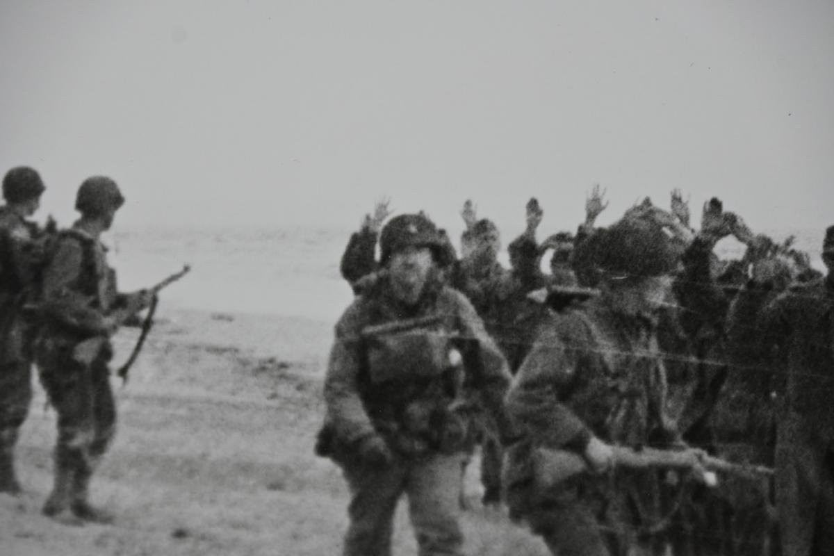 US WW2 Press Photo 'Prisoners of War on the Normandy Beach' — image 5