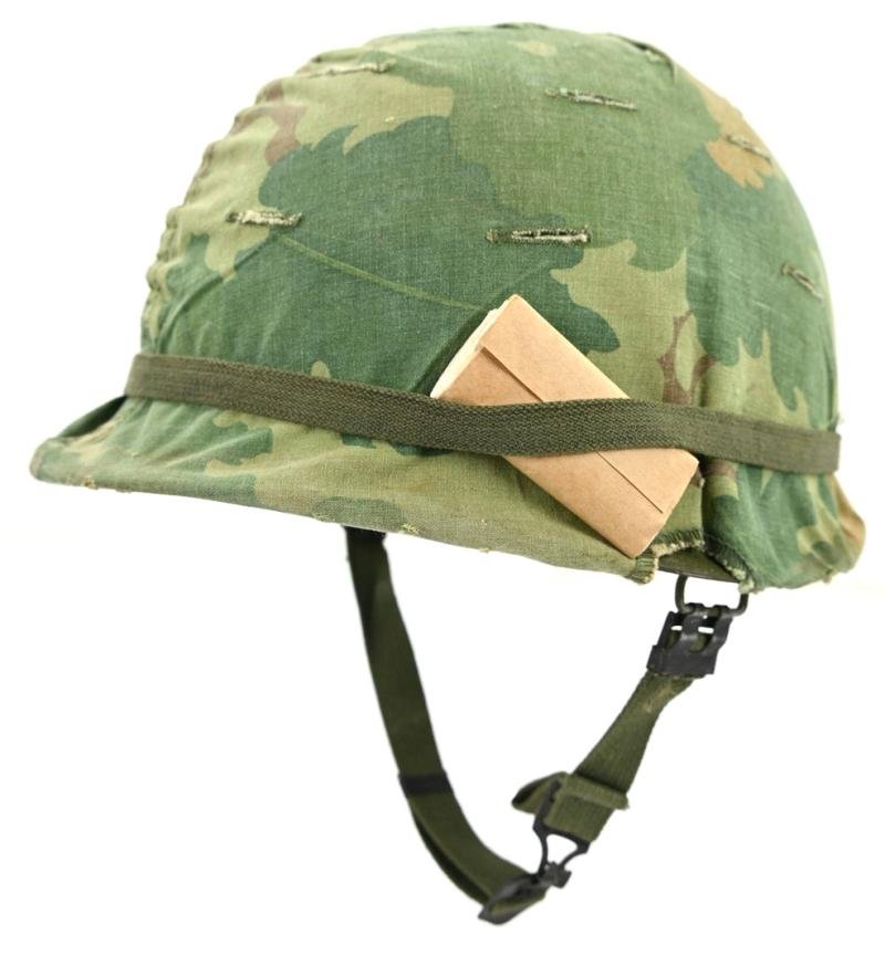 US Vietnam War Infantry helmet with camouflage cover and attached content — image 3