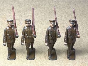 123) Set of 4 Vintage Original Marching Lead Soldiers
