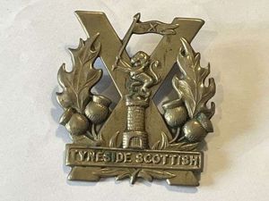 35) Excellent Original WW1 Cap Badge The Tyneside Scottish