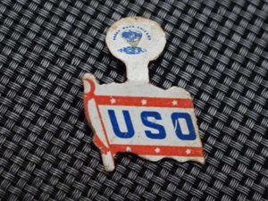 105) Nice Original WW2 American USO Clamp on Tin Badge