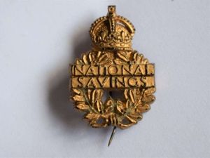 29) Original WW2 Gold Plastic/Bakelite National Savings Pin Badge