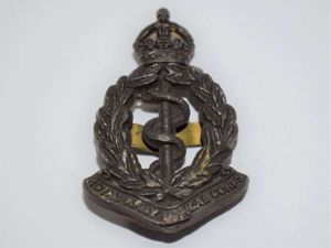 80) Good Original WW2 British RAMC Plastic Economy Cap Badge
