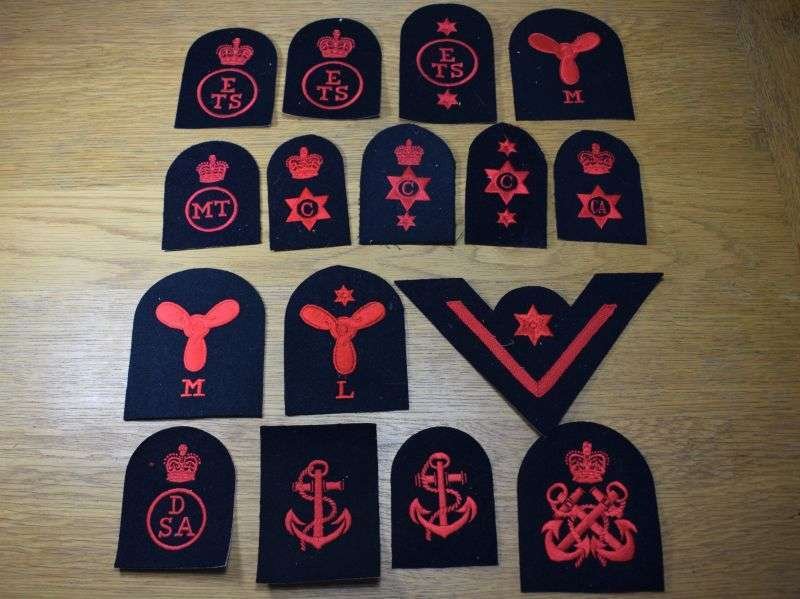 77) Group of 58 Vintage Royal Navy Red on Black Woven Trade Badges — image 3