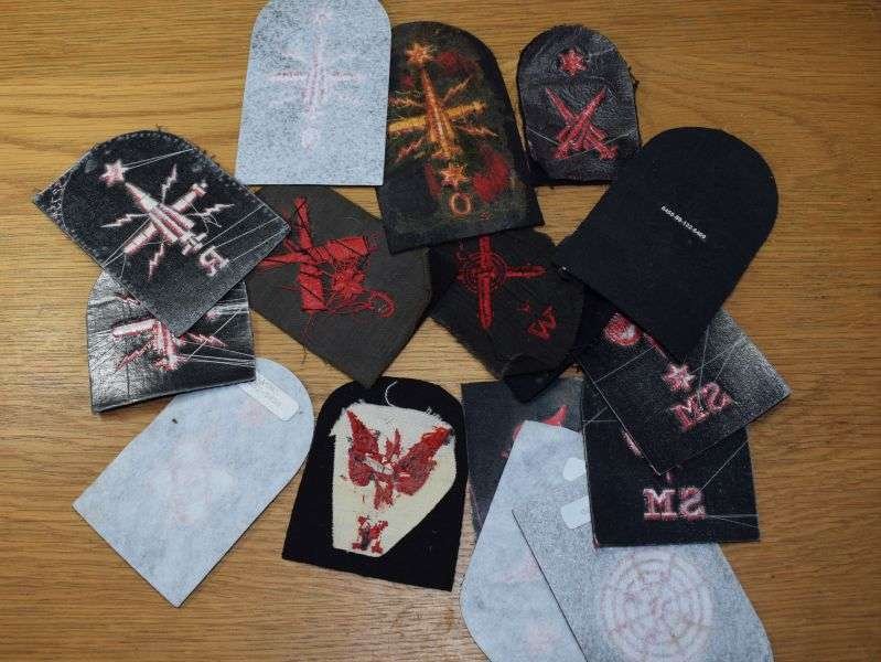 77) Group of 58 Vintage Royal Navy Red on Black Woven Trade Badges — image 4