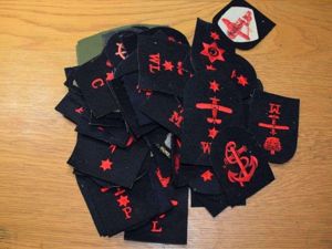 77) Group of 58 Vintage Royal Navy Red on Black …