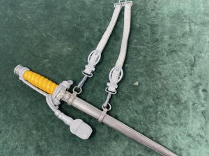 A NAMED & STONE MINT ARMY DAGGER/STRAPS & KNOT.