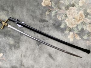 A VERY EARLY ALCOSO LIONS HEAD PARADE SWORD.