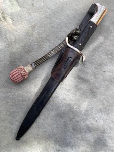 THIRD REICH FIREMAN'S SAW-BACK BAYONET WITH ORIGINAL PORTAPEE AND FROG.