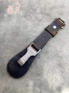 BLACK LEATHER 'TEAR DROP' SWORD HANGER.