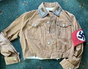 AN EARLY PRE-1939 NADAP BROWN UNIFORM SHIRT.