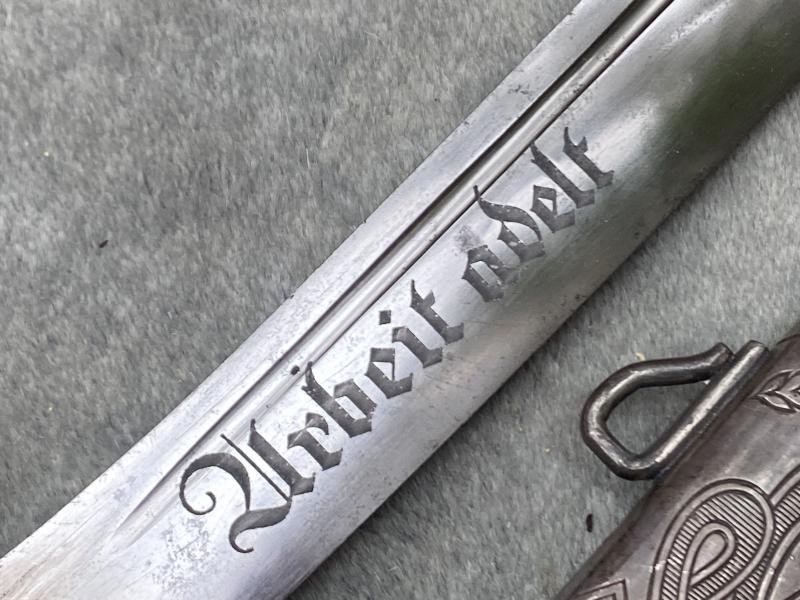 AN EXCELLENT EXAMPLE OF A RAD OFFICERS DAGGER COMPLETE WITH LEATHER STRAPS. — image 8