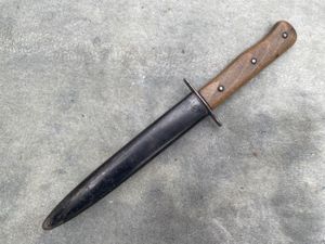 A LUFTWAFFE FIGHTING KNIFE WITH 'Rb' MARKED BLADE AND ALSO …