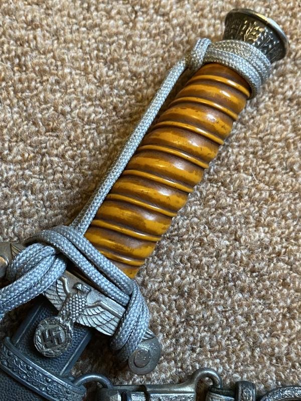 ARMY DAGGER WITH KNOT AND HANGERS HAS FULL DISTRIBUTOR NAME ON THE BLADE! — image 5