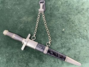 A POSTSCHUTZ OFFICERS DAGGER BY WEYERSBERG