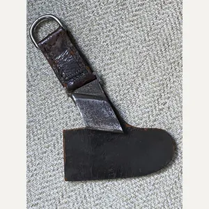 AN UNUSUAL, ORIGINAL HANGER FOR A RAD HEWER.