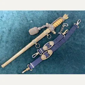 A WONDERFUL NAVY DAGGER BY WKC WITH ORANGE GRIP, HAMMERED …