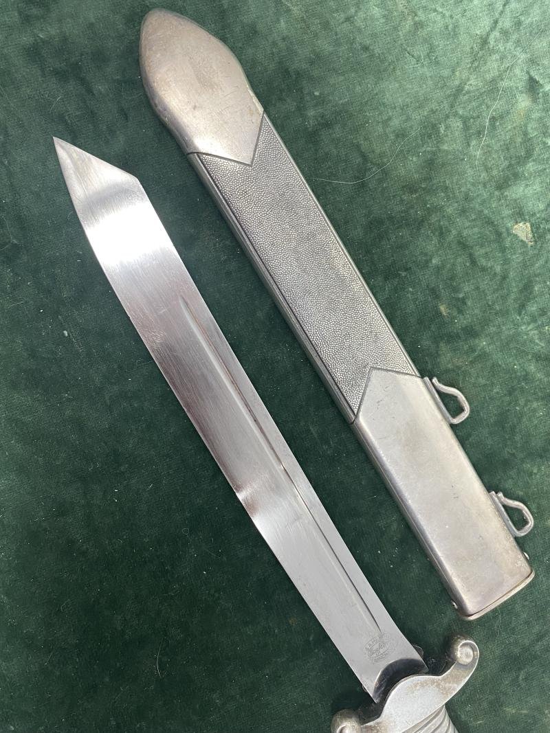 A NEAR PERFECT RAD OFFICERS DAGGER WITH VERY RARE MAKER AND WITH COMPLETE MINT HANGERS INCLUDING THE TOP CLIP!!. — image 8
