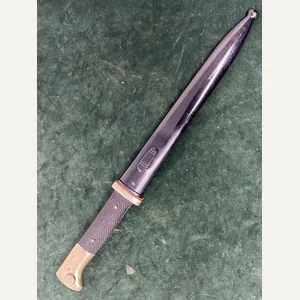 A NEAR MINT EXAMPLE OF A SHORT K98 'PIONEER' DRESS …