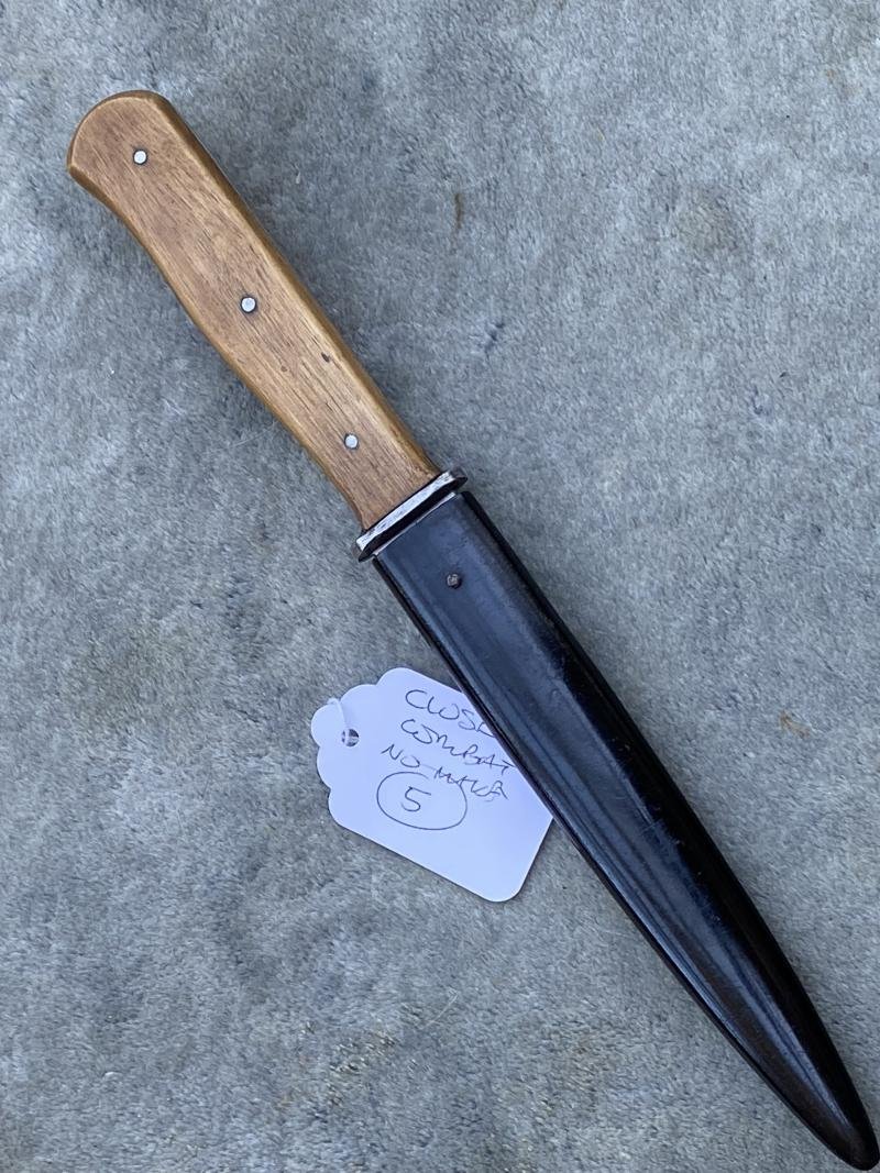 A THIRD REICH 'NAHKAMPFMESSER' IN MINT CONDITION. — image 2